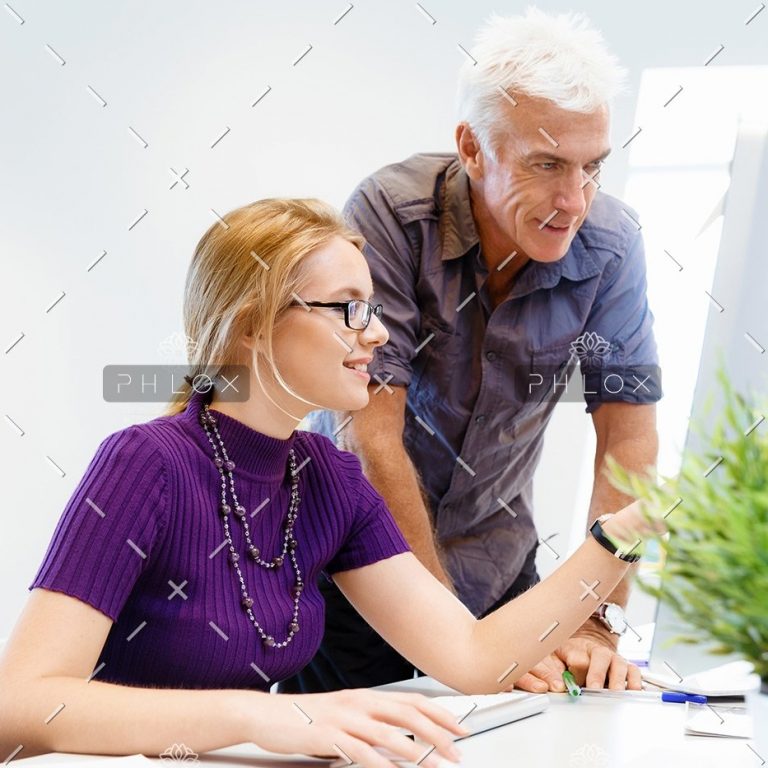 demo-attachment-117-co-workers-working-together-PRZ8DTV